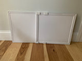 White Easy AC Screen on a wooden floor against a neutral wall